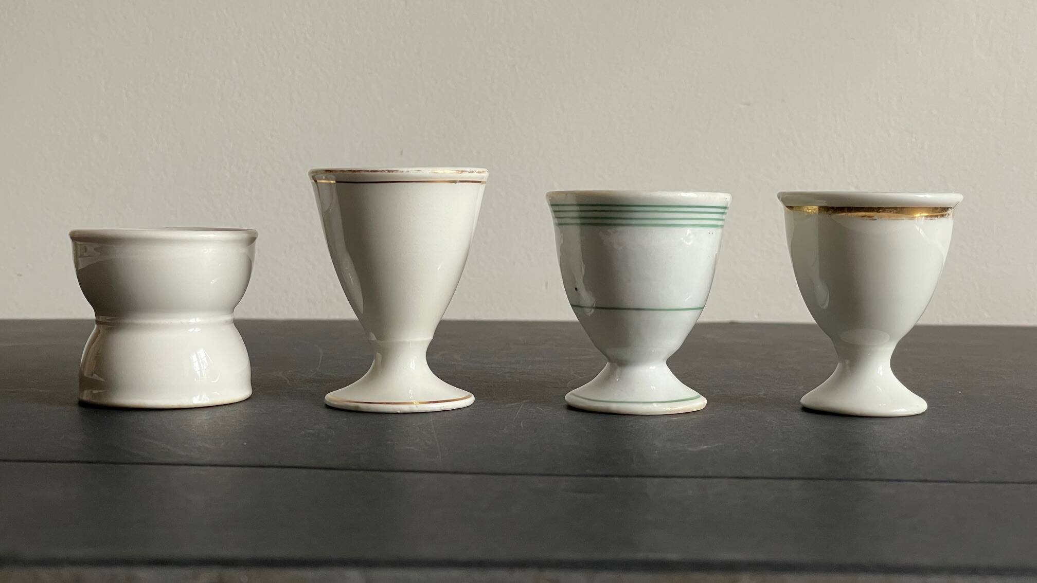 4 antique ceramic egg cups