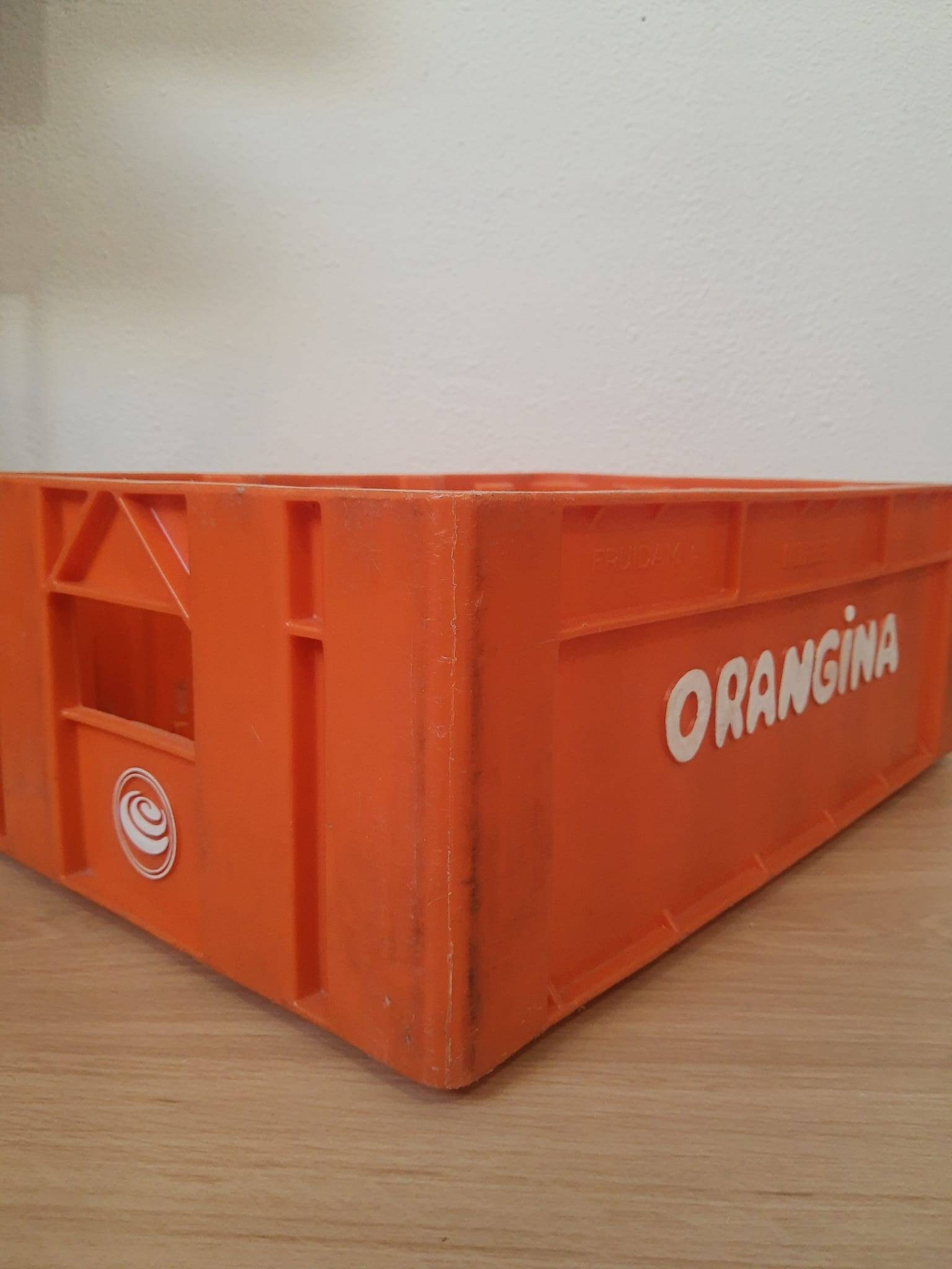 Vintage Orangina advertising bottle crate
