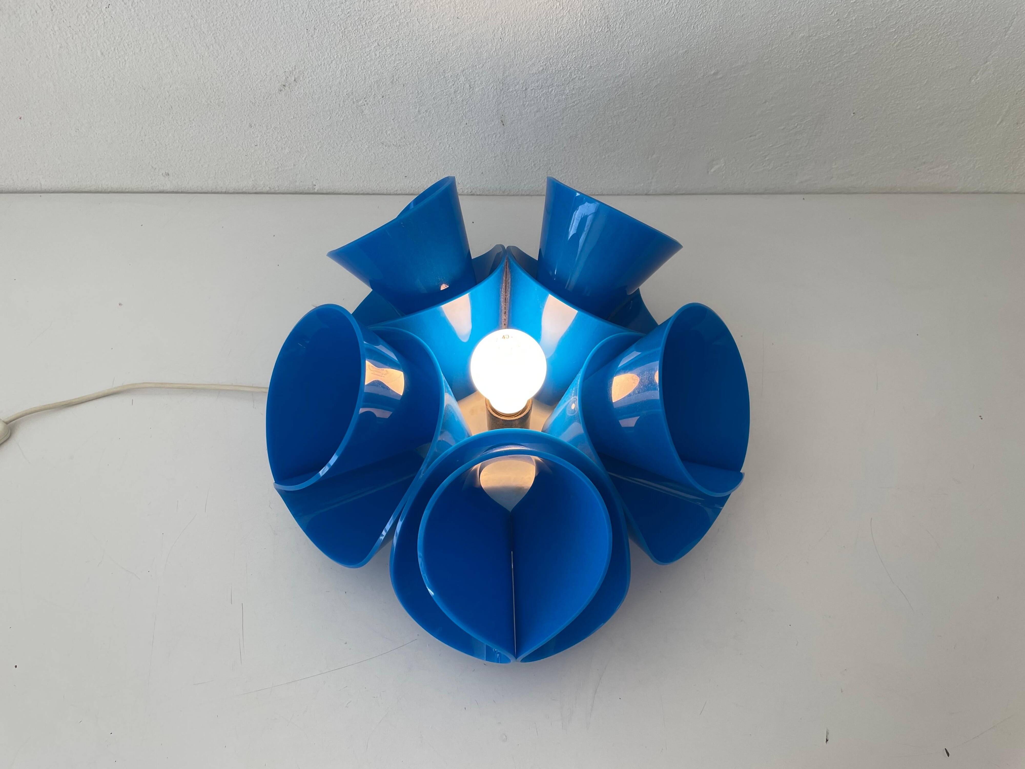 Blue plexiglass table lamp, Flower Design, 1970s, Italy.