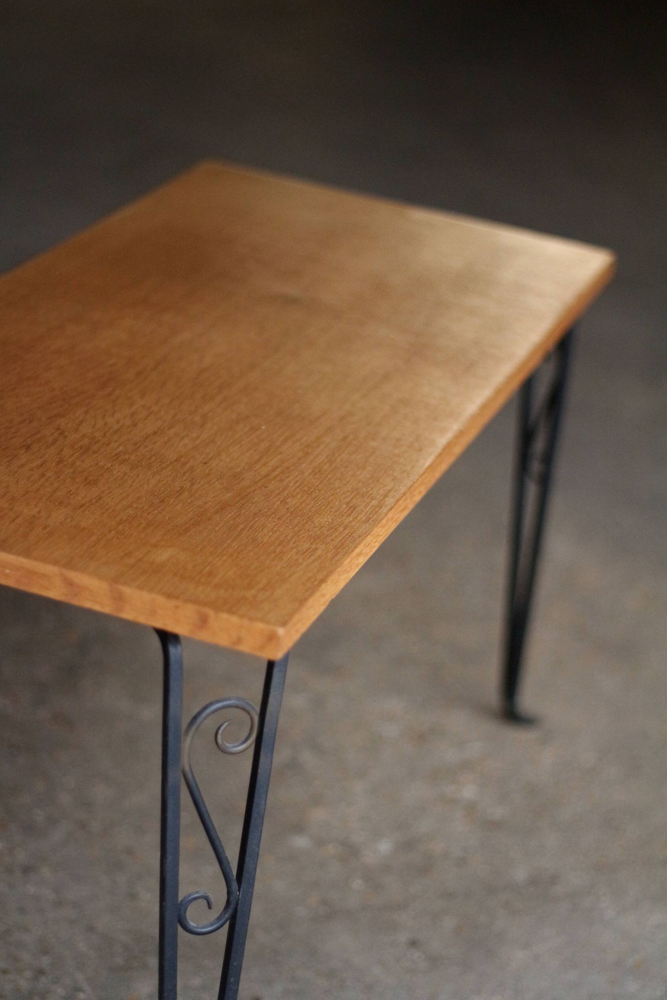 Nice vintage coffee table (1970s). Made of plywood and cast iron.