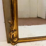 Miroir de style Louis XV en bois et stuc doré XX siècle