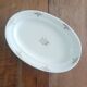 Plat ovale Villeroy et Boch, fleurs dorées