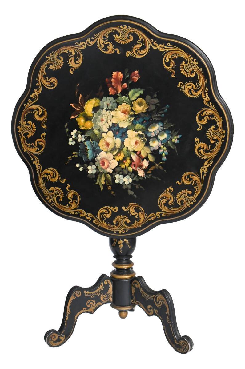 Blackened wooden side table decorated with a painted bouquet of flowers.