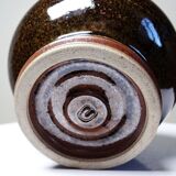 Brown and green glazed stoneware flower holder, vintage craftsmanship from the 1970s-1980s.