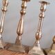 Set of 10 bronze-tinted brass candle holders 01 Pro