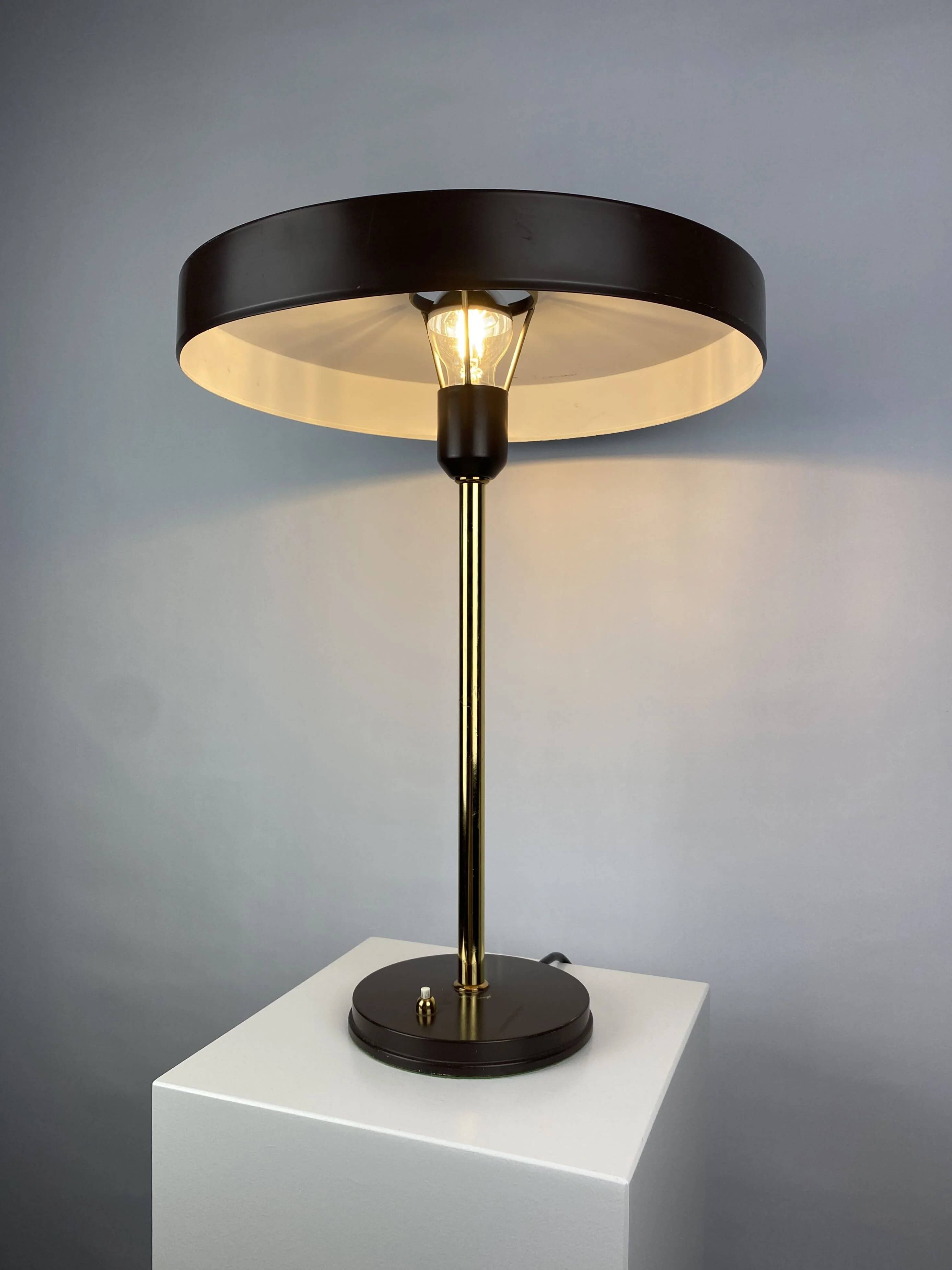 One of the four brown and gold Timor 69 table lamps by Louis Kalff for Philips 1970.