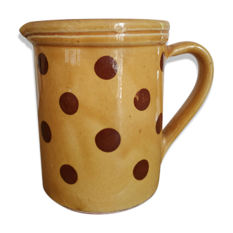 Old pitcher or polka dot vase