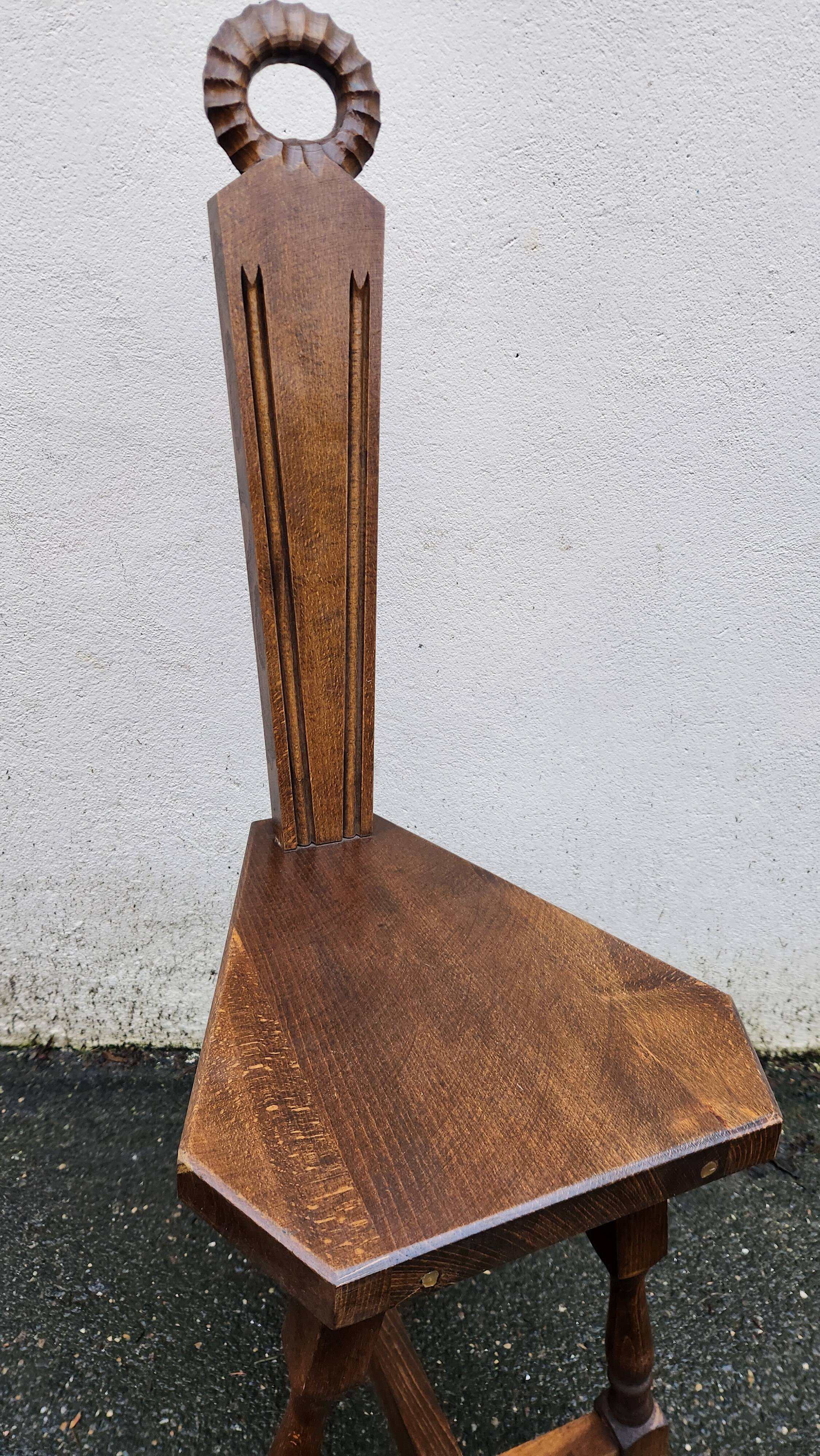 2 three-legged chairs made of solid wood