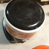 Vintage kettle in enamelled sheet metal