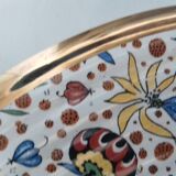 Vintage dish with floral motifs
