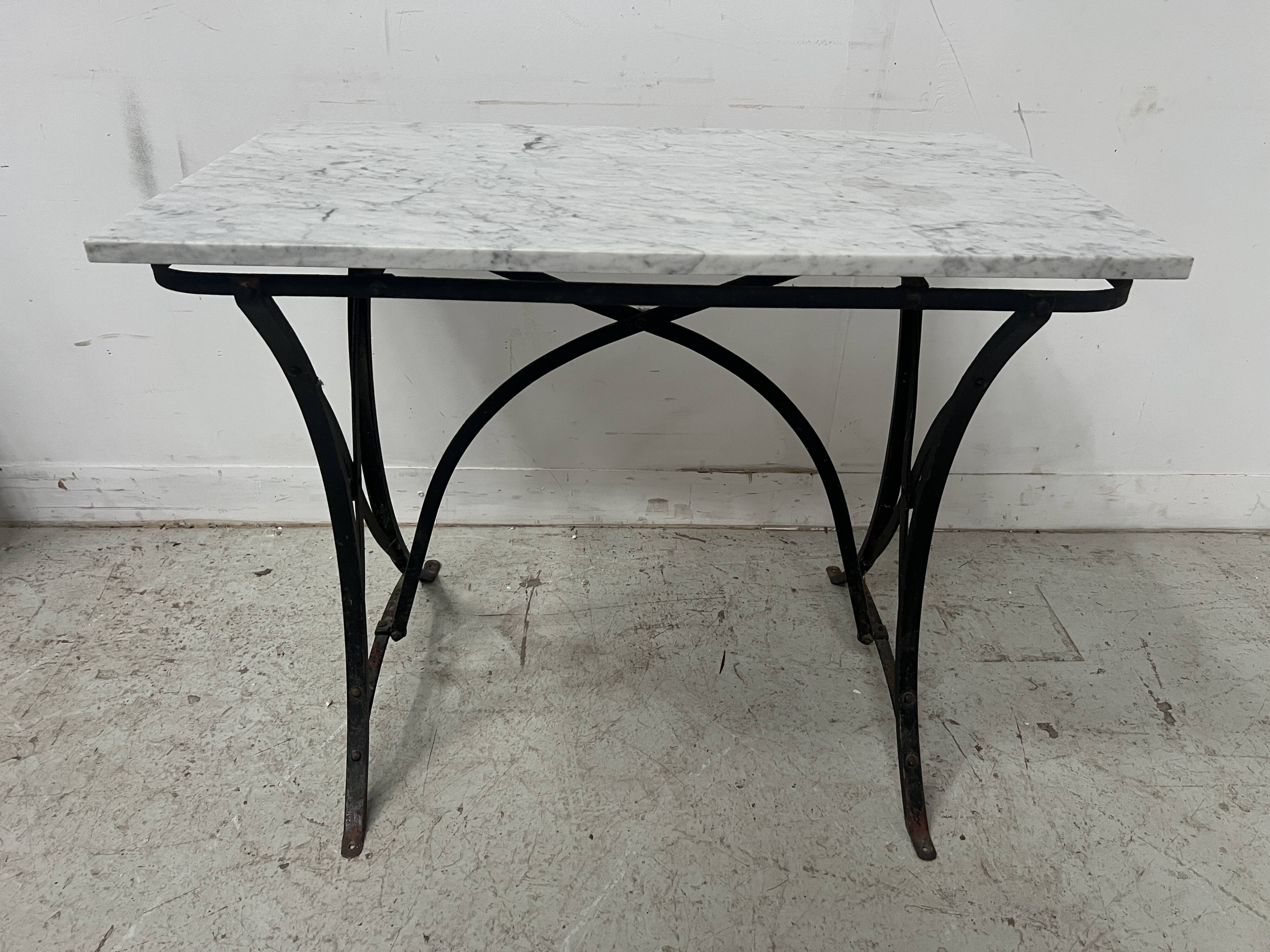 Garden table or veranda in cast iron from the 20th century.