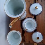 Coffee pot, sugar pot, 1 cup and saucer.