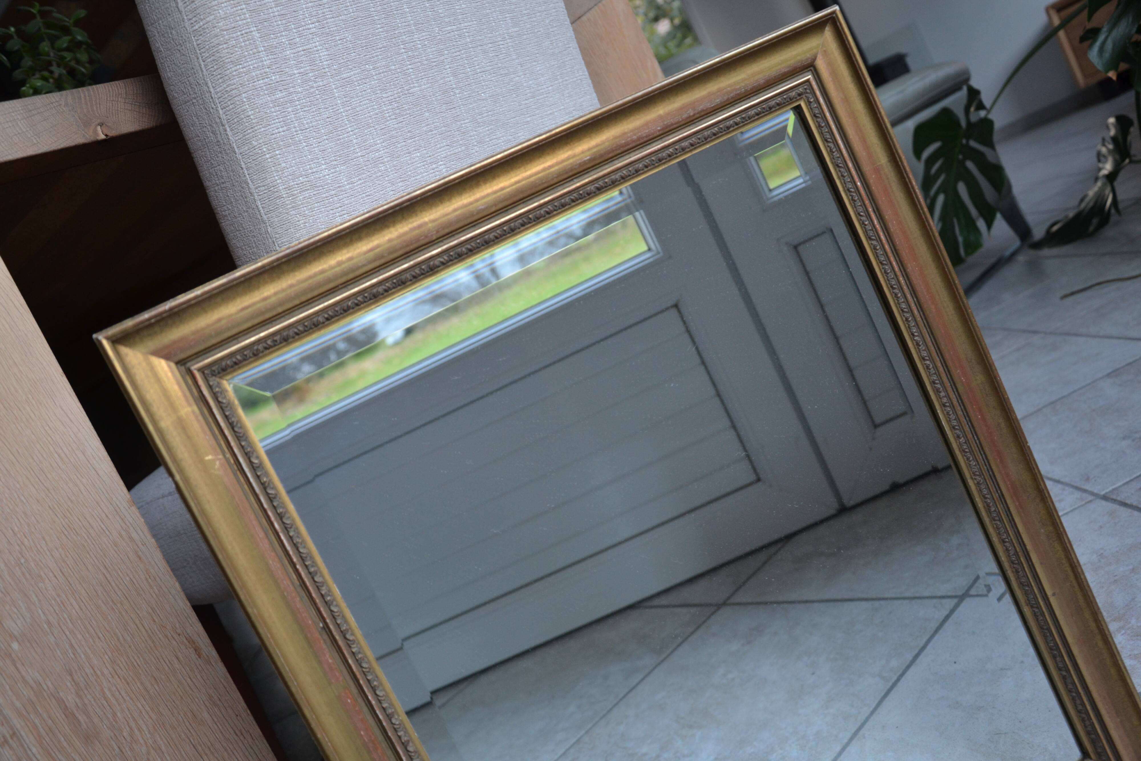 Beveled golden mirror
