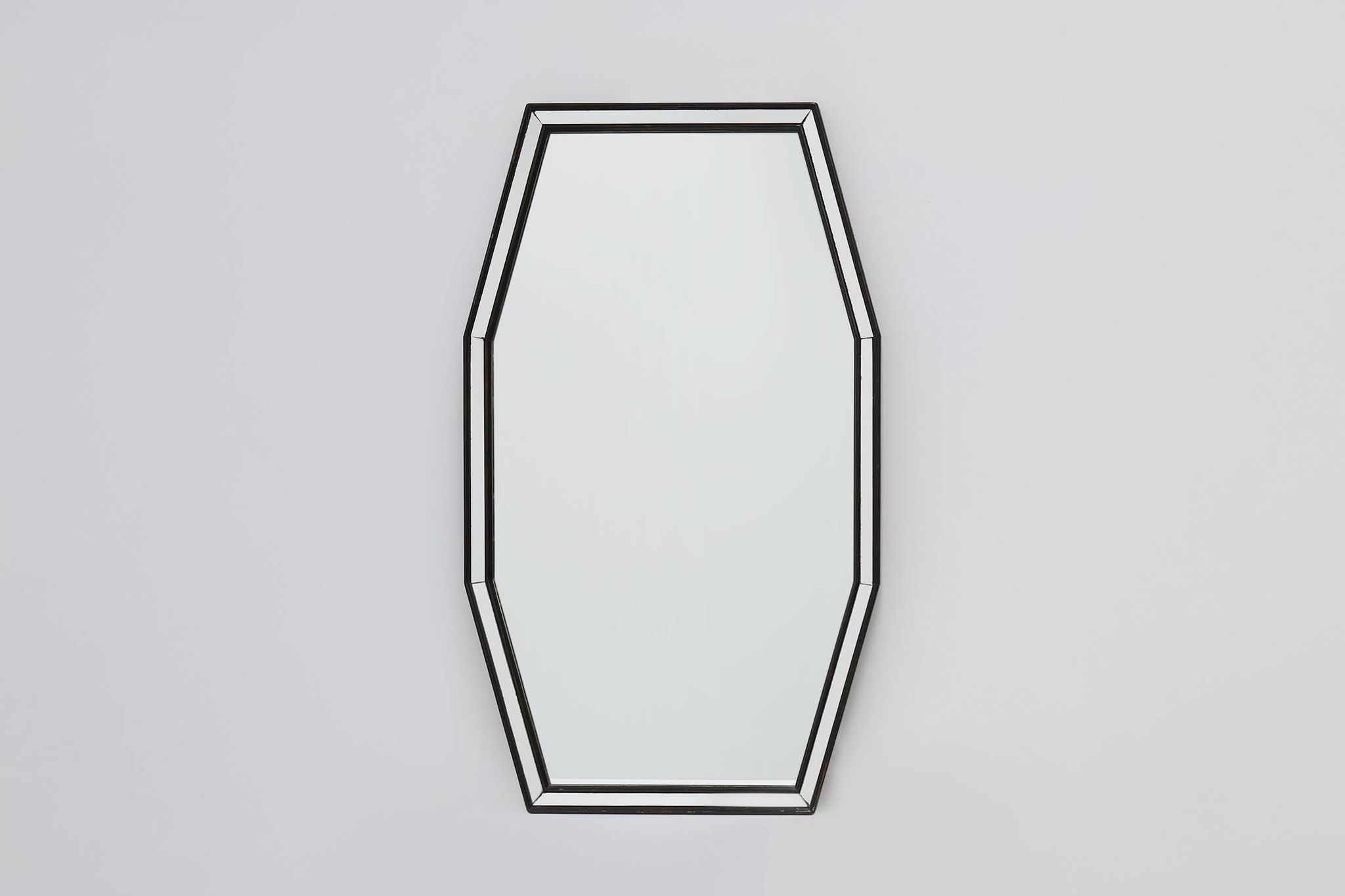 Miroir octogonal graphique du milieu du siècle avec cadre en bois noir et miroir,