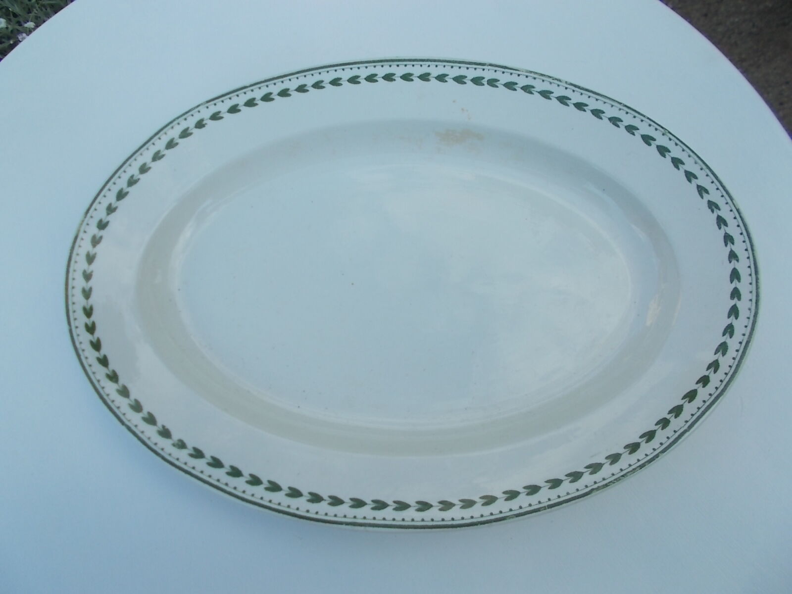 Large oval flat 27 x 37 cm faience b.f.k laurel model