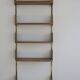 Art Deco modular wall shelf on brass brackets, 1920-30