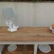 Craft furniture enhanced in pearl gray, shelves and top in raw wood.