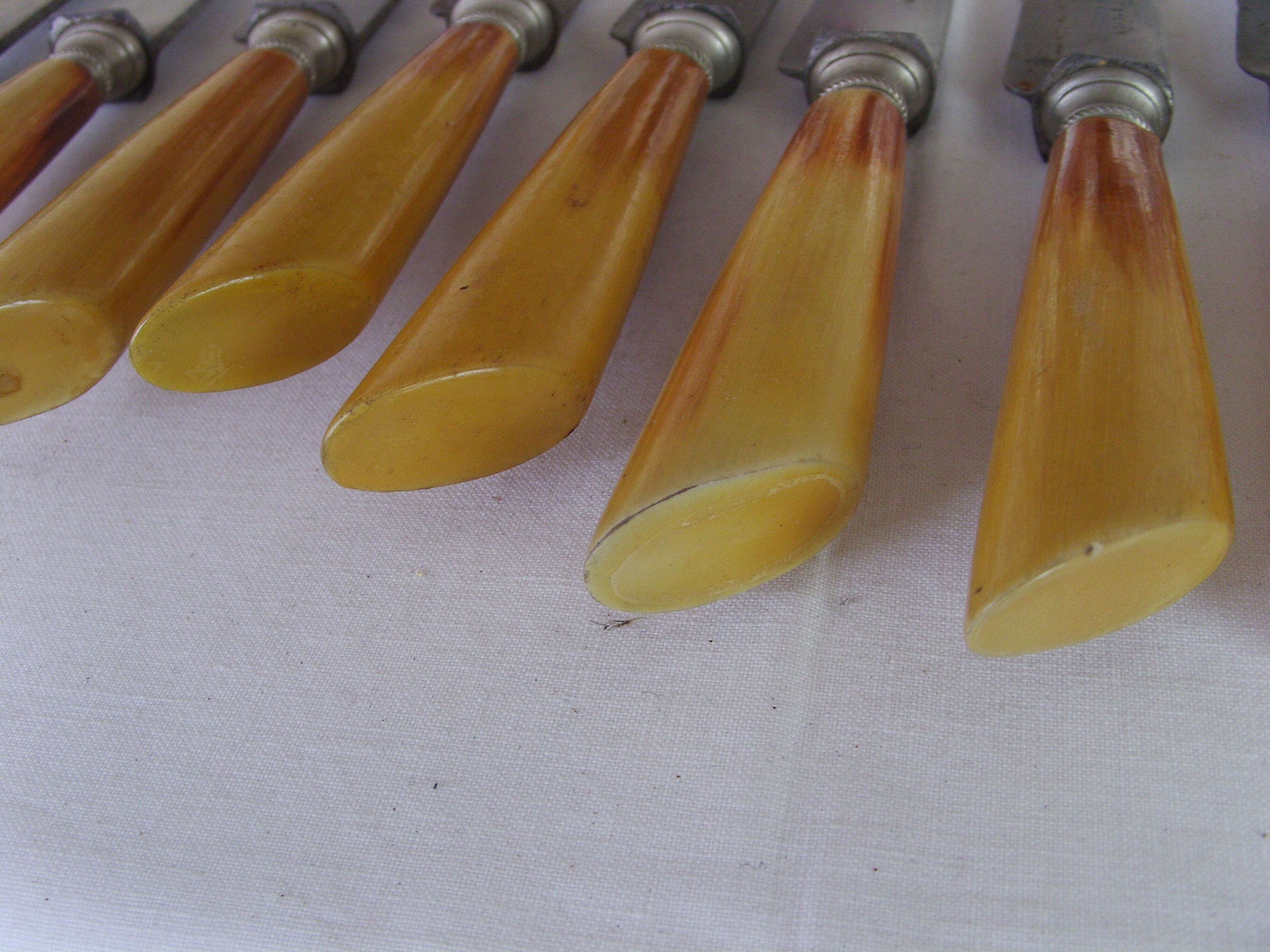 12 old large table knives