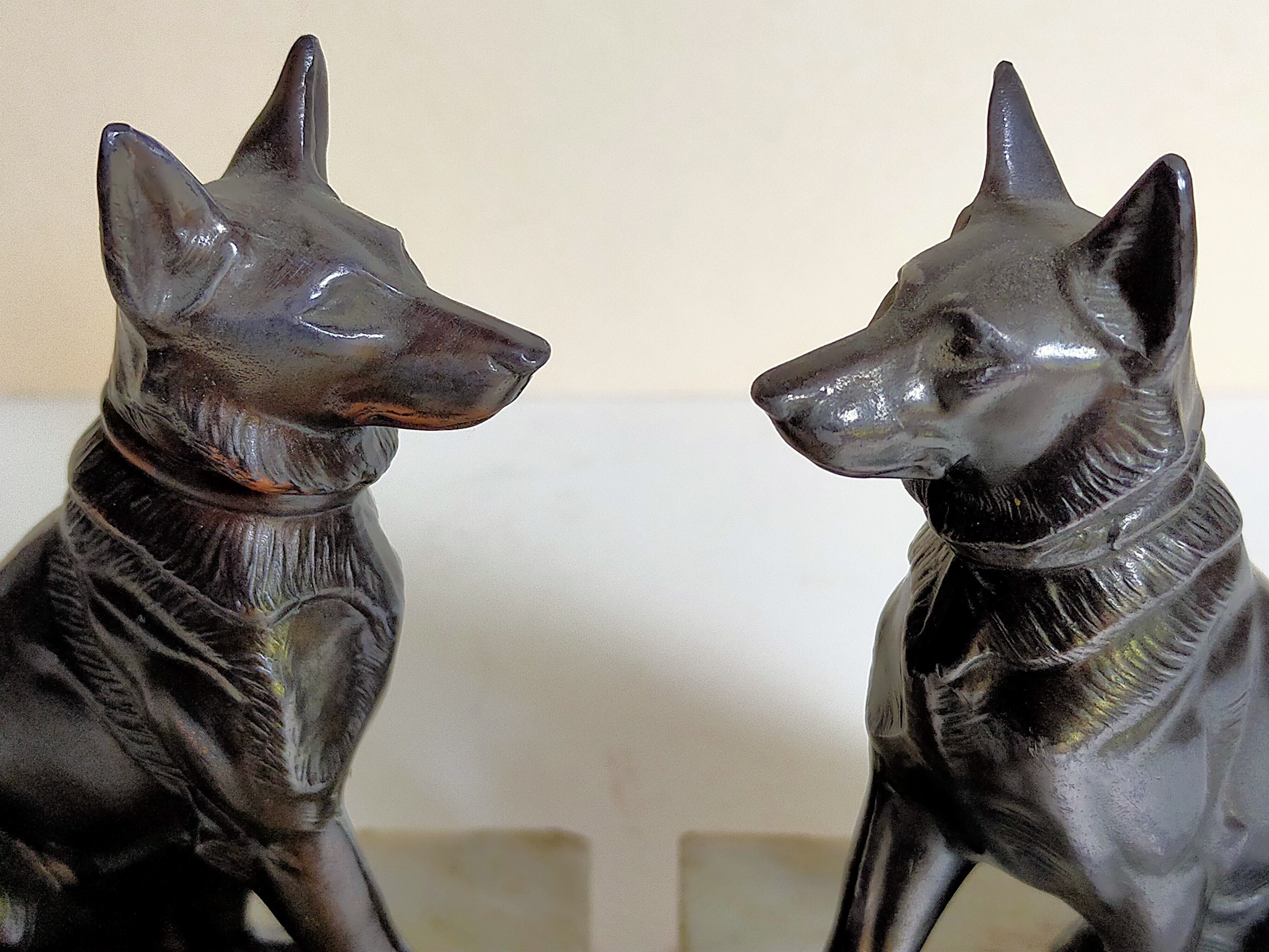 Pair of Art Deco bookends to signed wolf dogs