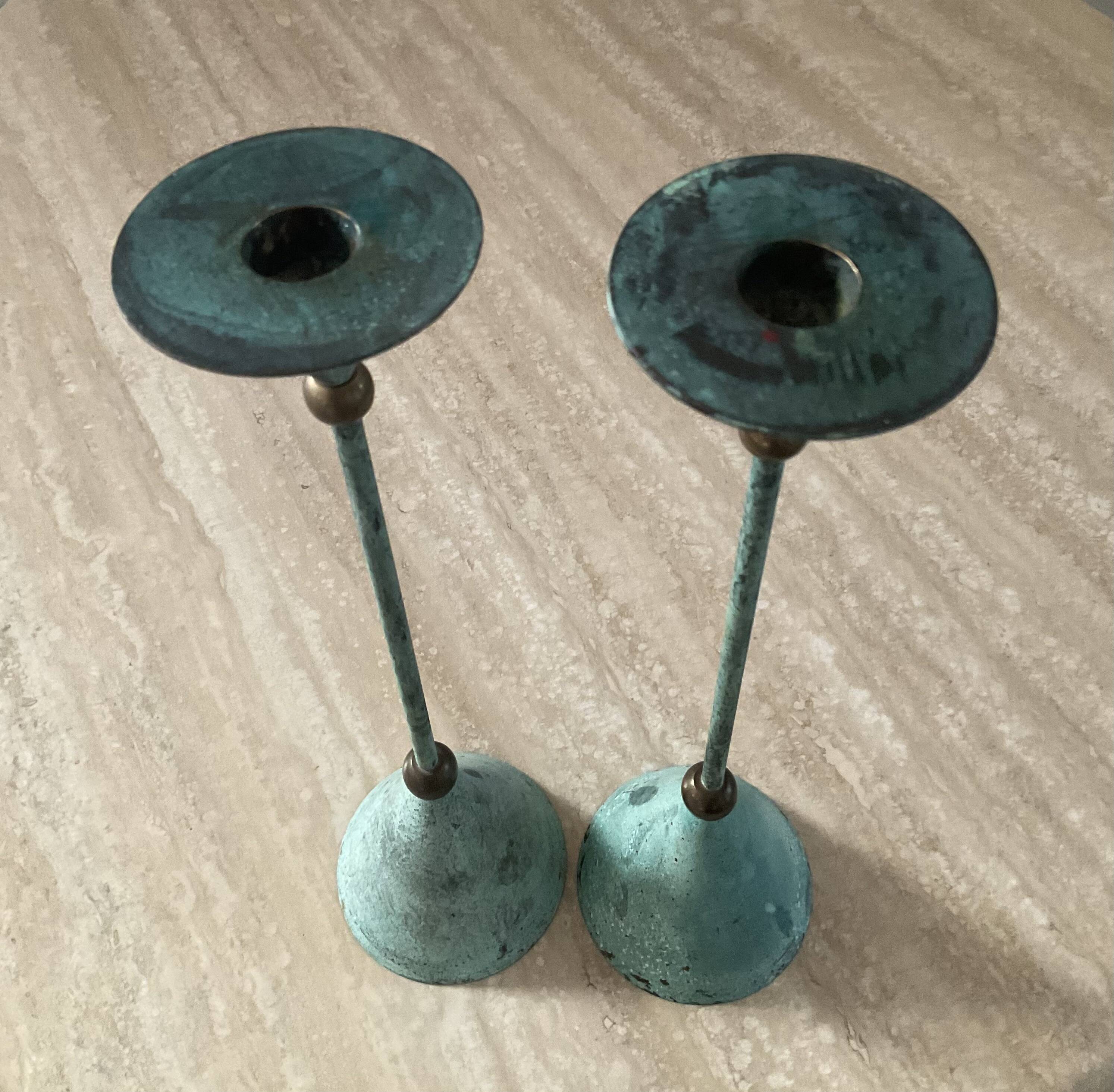 Pair of vintage brass and metal candlesticks