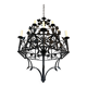 Lustre with 12 lights in wrought iron decorated with clovers and foliage.