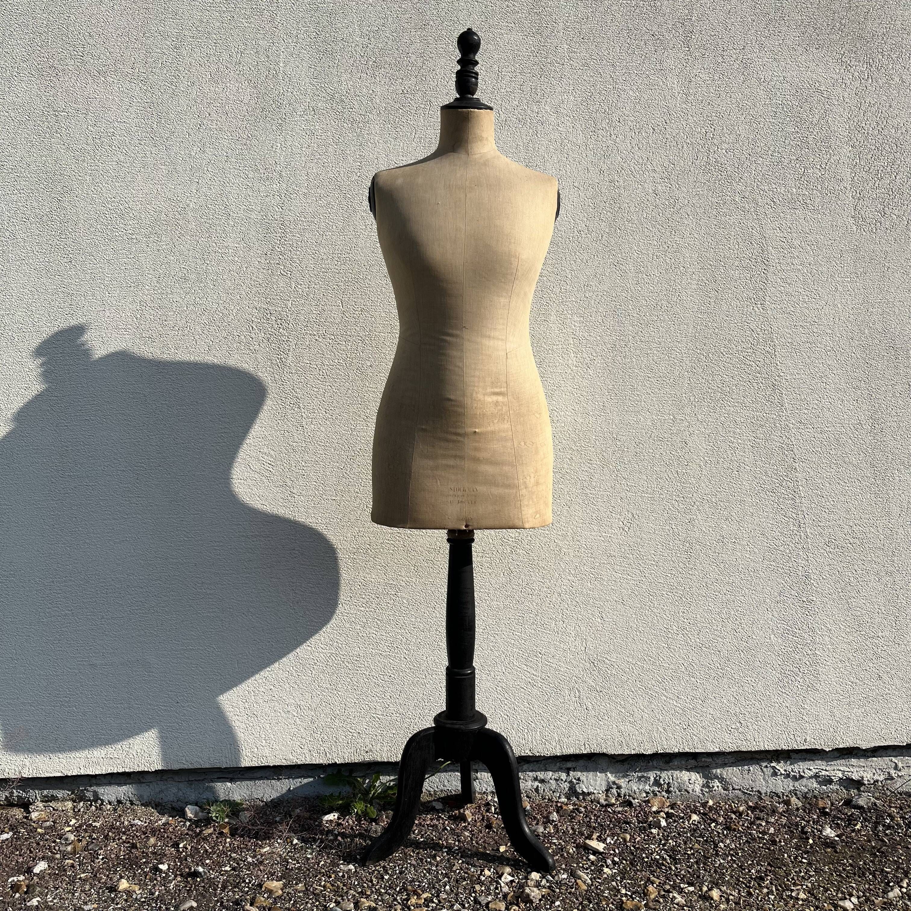 Antique mannequin in fabric and blackened wooden foot Stockman Paris Le Louvre