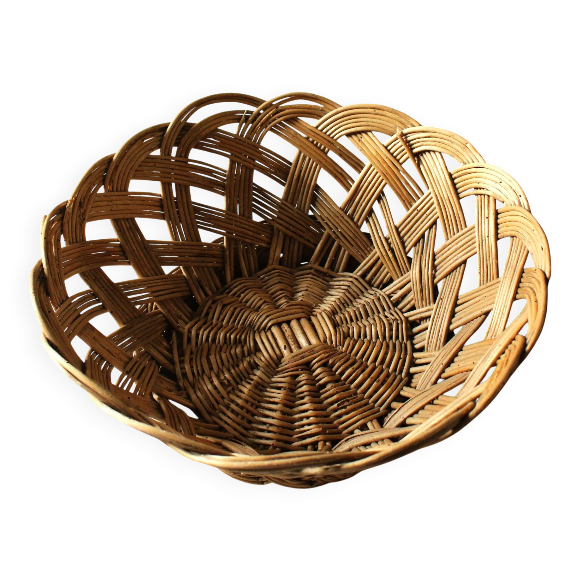 Large vintage twisted wicker basket on a stand