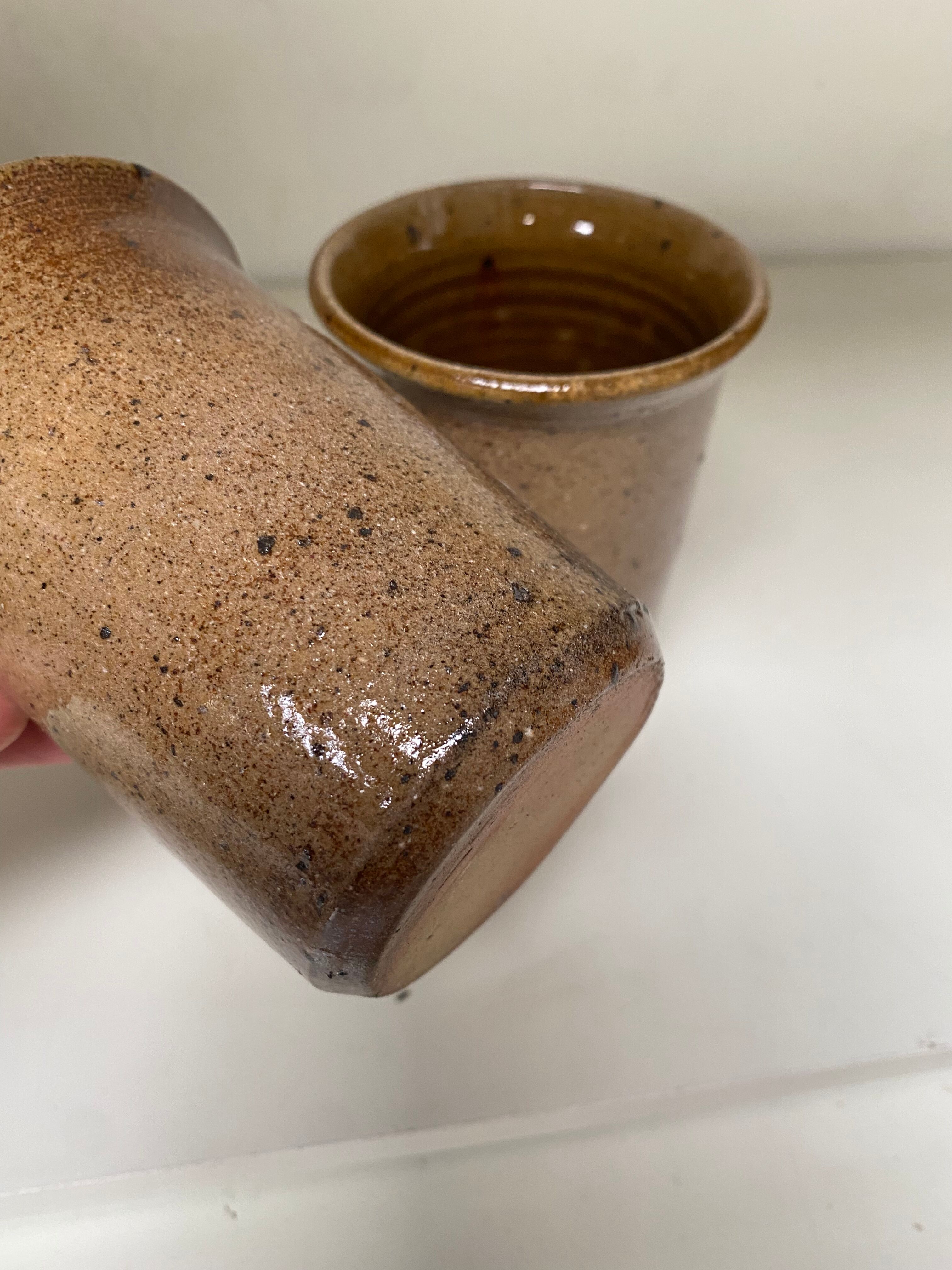 Pair of sandstone mugs