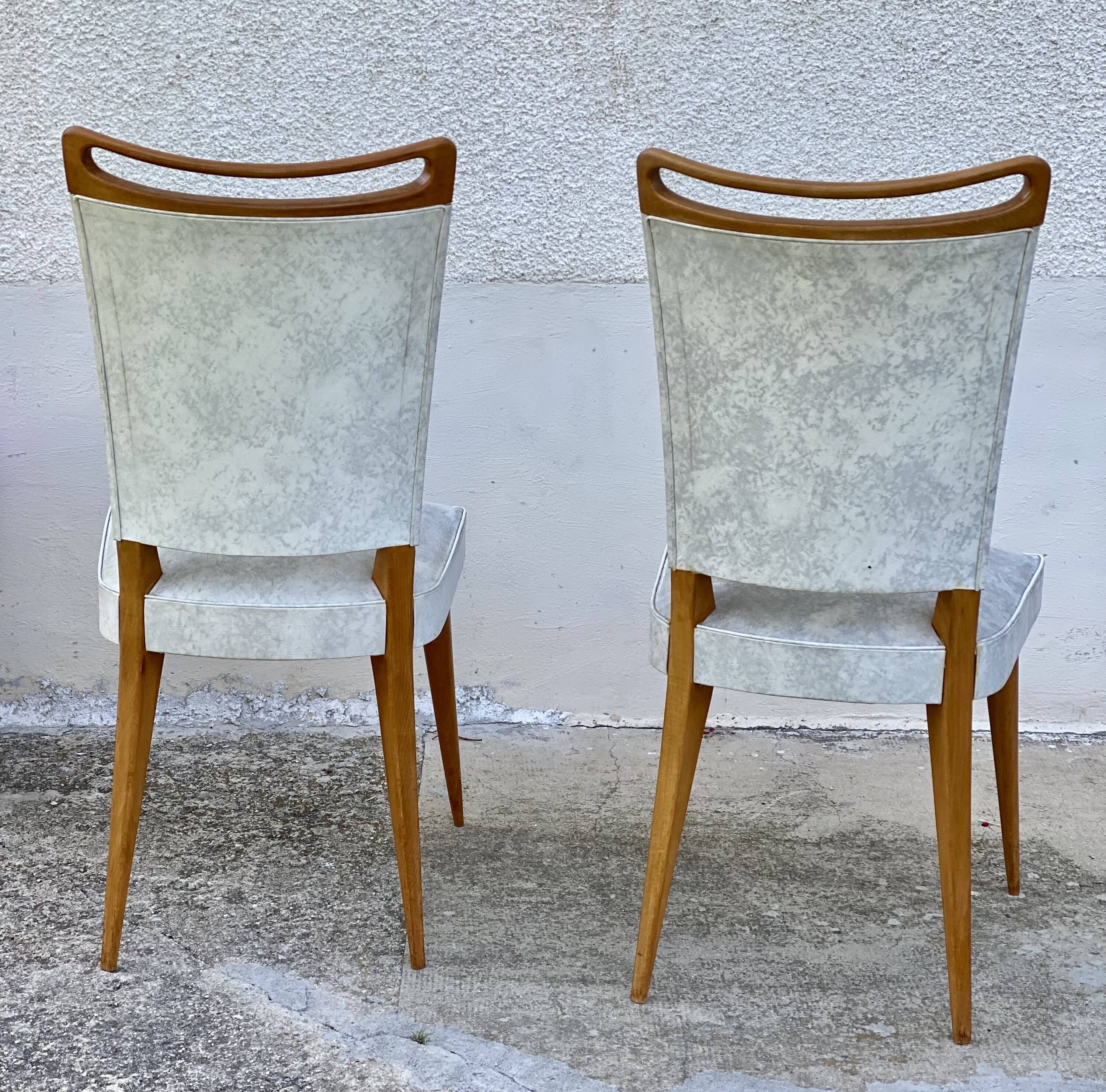 Pair of vintage 1960s compass-legged chairs in wood and white imitation leather