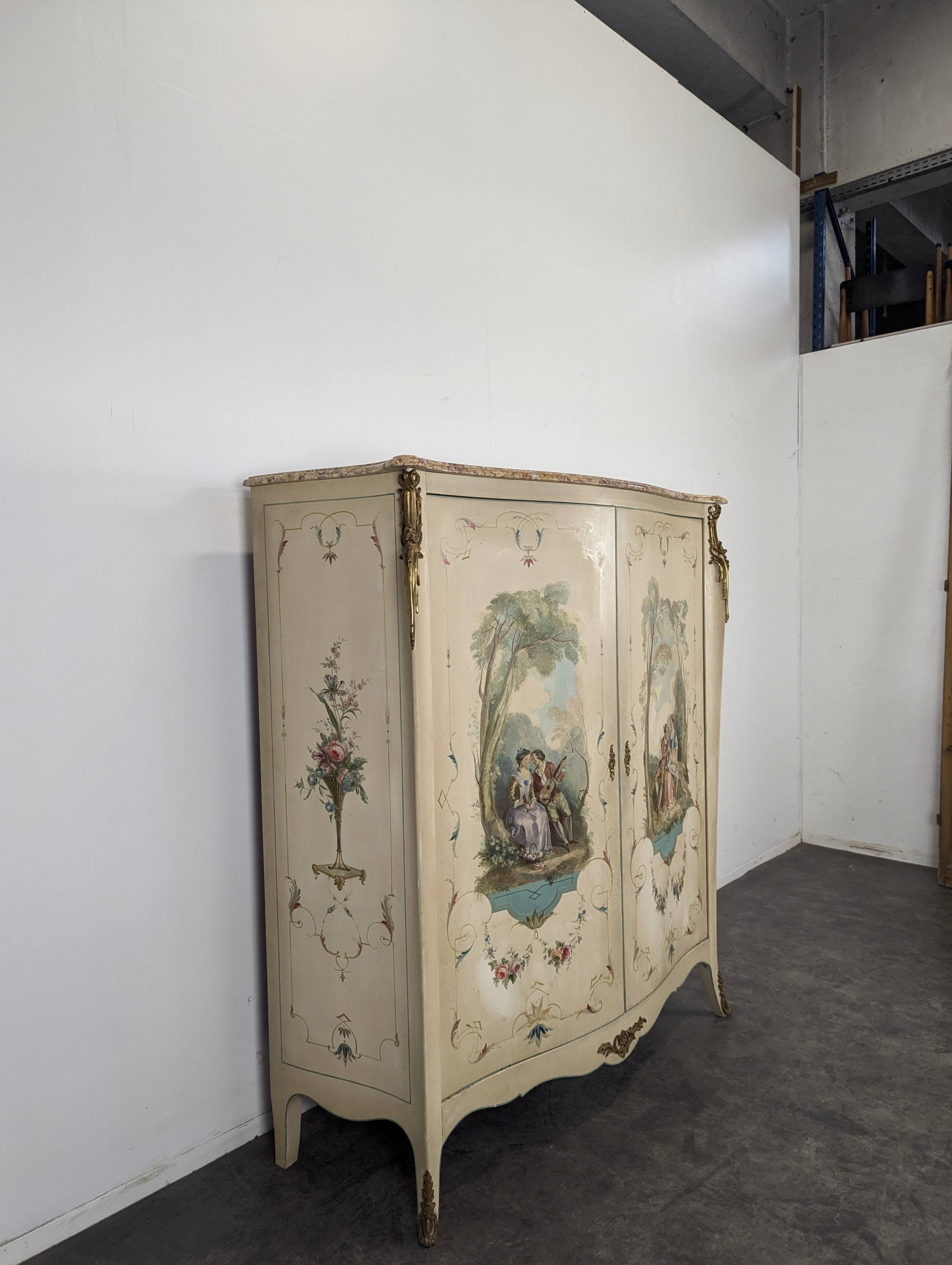 Louis XV style wardrobe with decorations of gallant scenes.