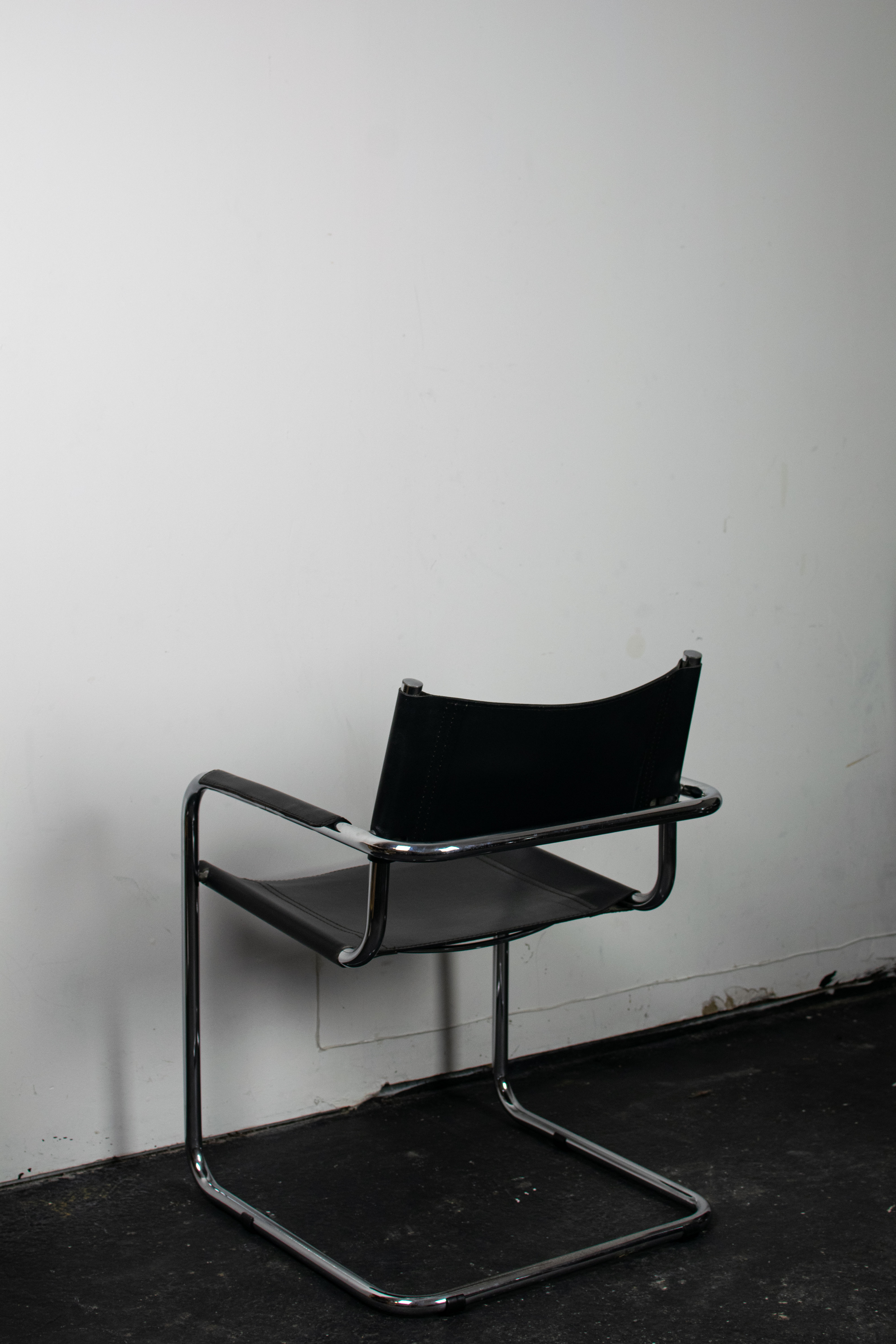 Black leather cantilever armchair 70s-80s