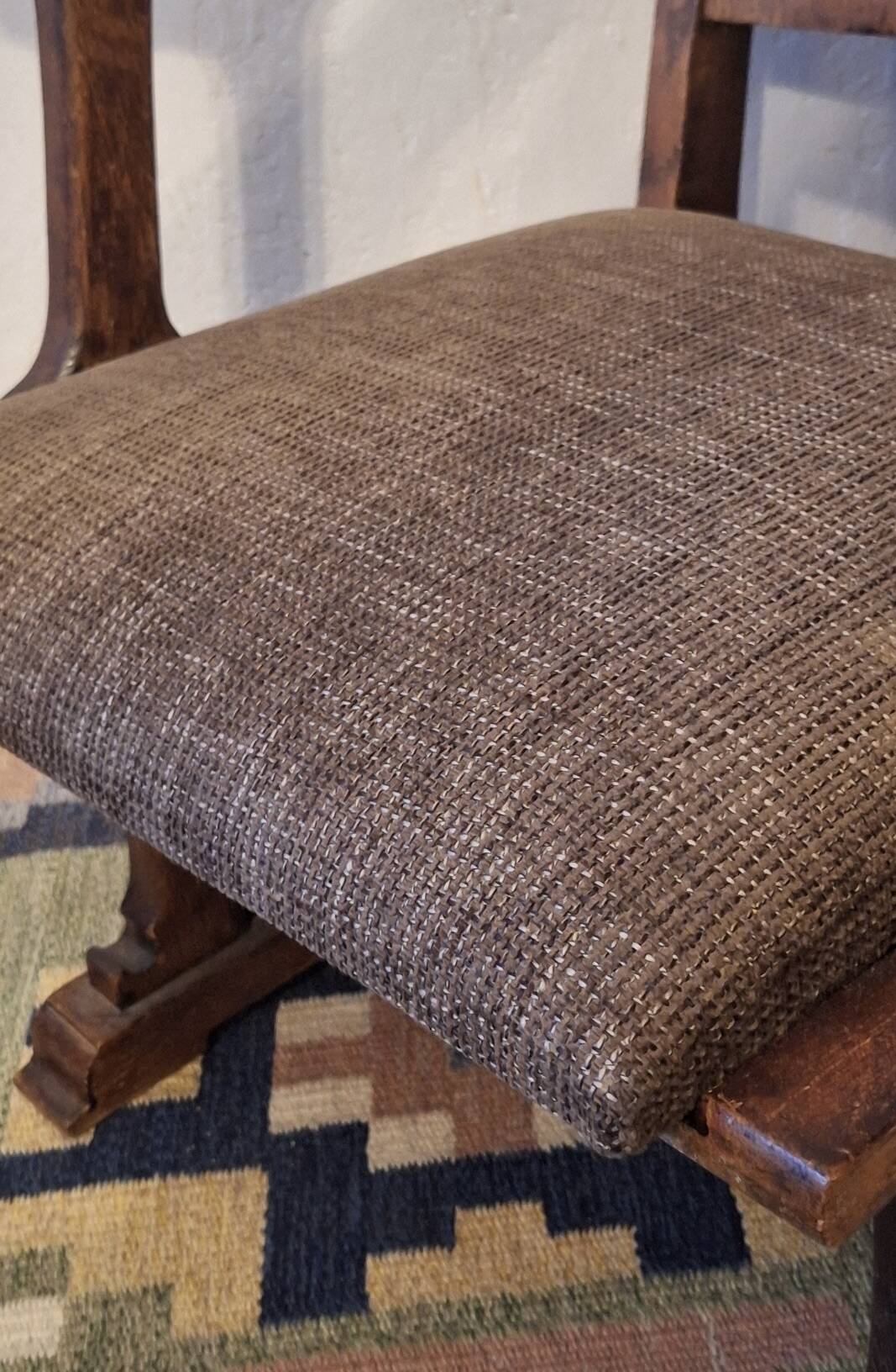 Antique arts and crafts carved oak armchair, 1910