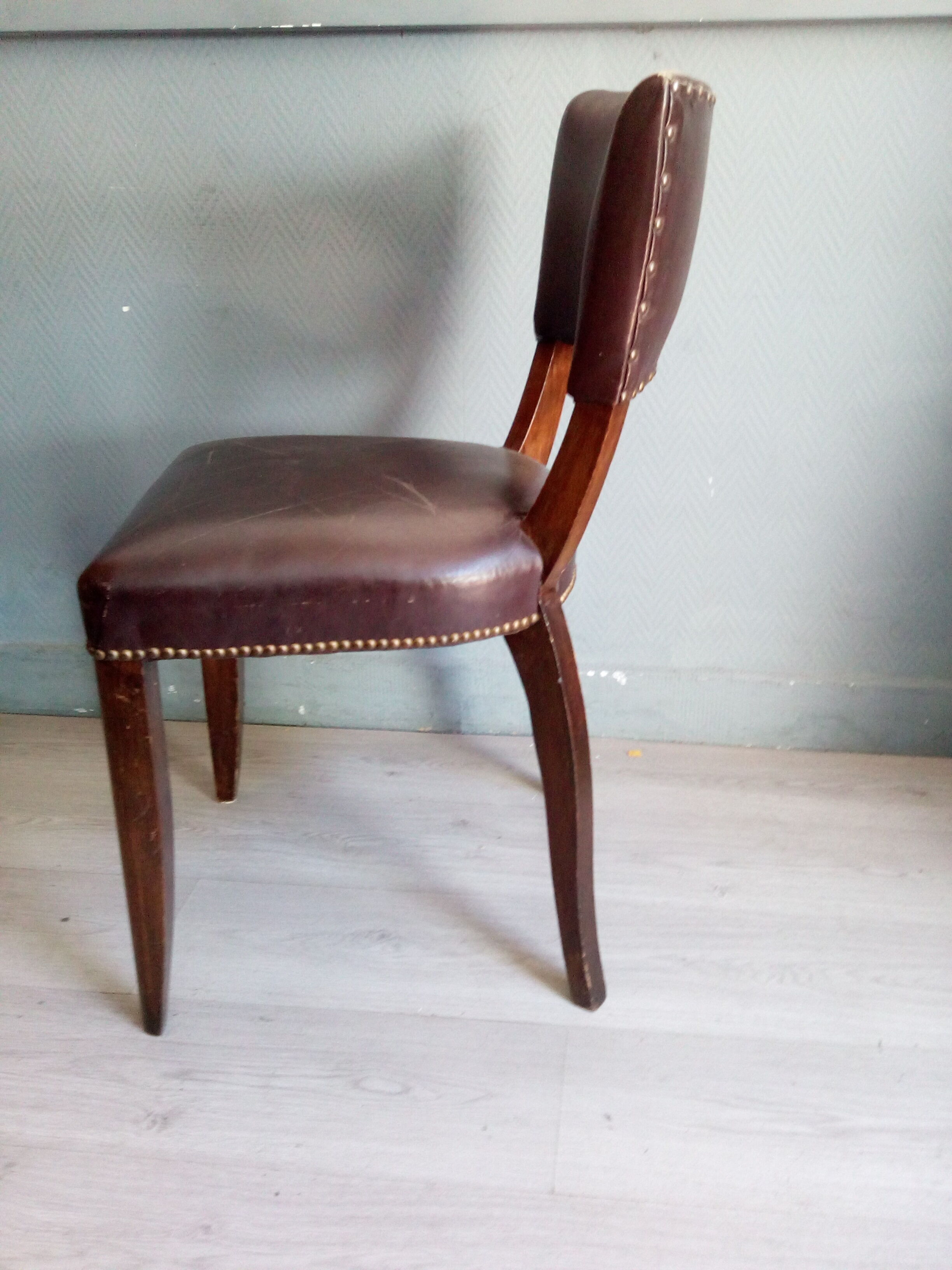 Lot of leather and vintage wood chairs