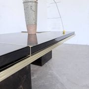 "Rizzo" lacquered and brass coffee-bar table from the 1970s.