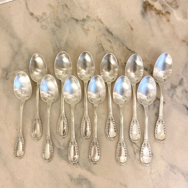Series of 12 dessert spoons, silver metal