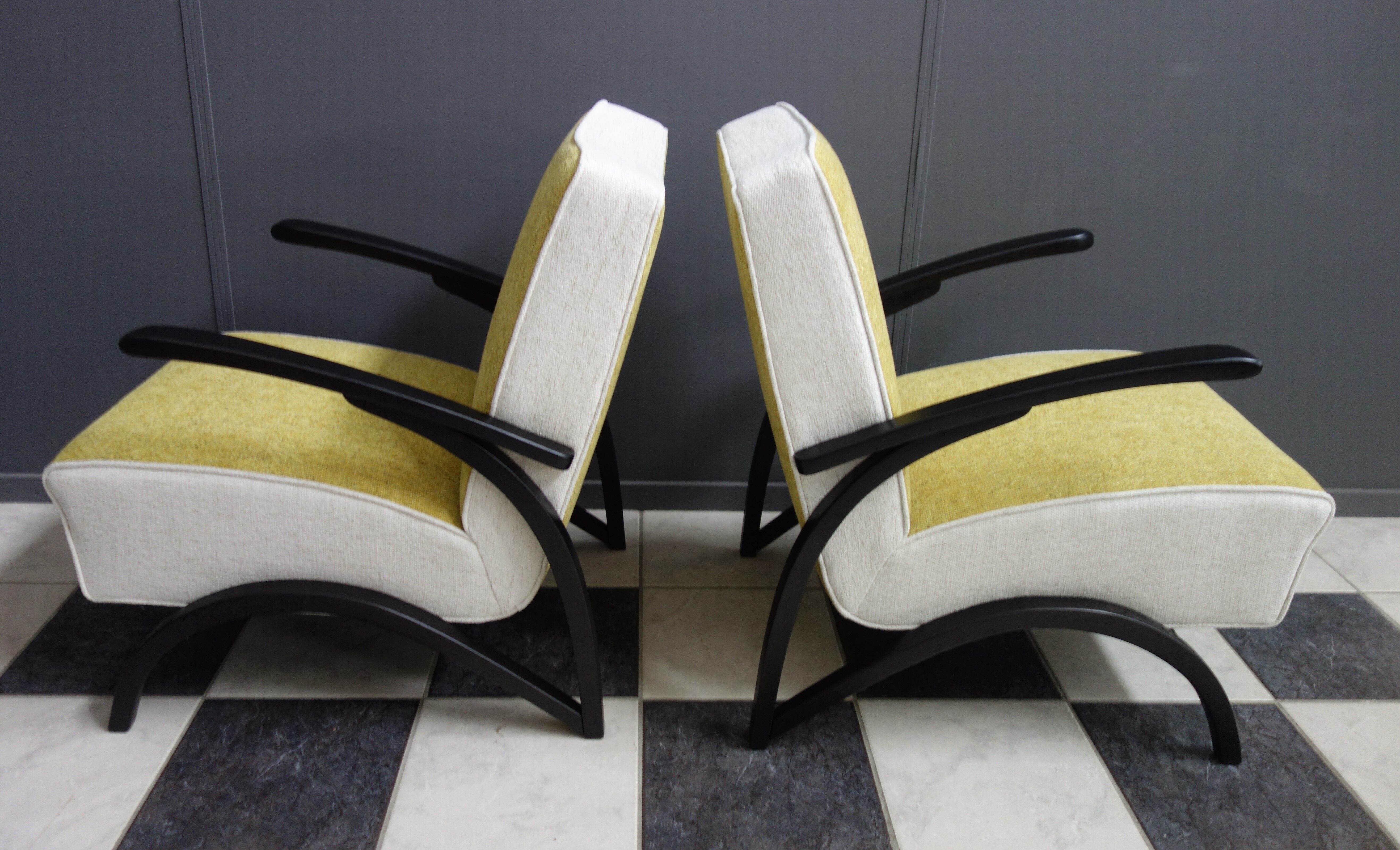 Jindrich halabala chairs yellow and white