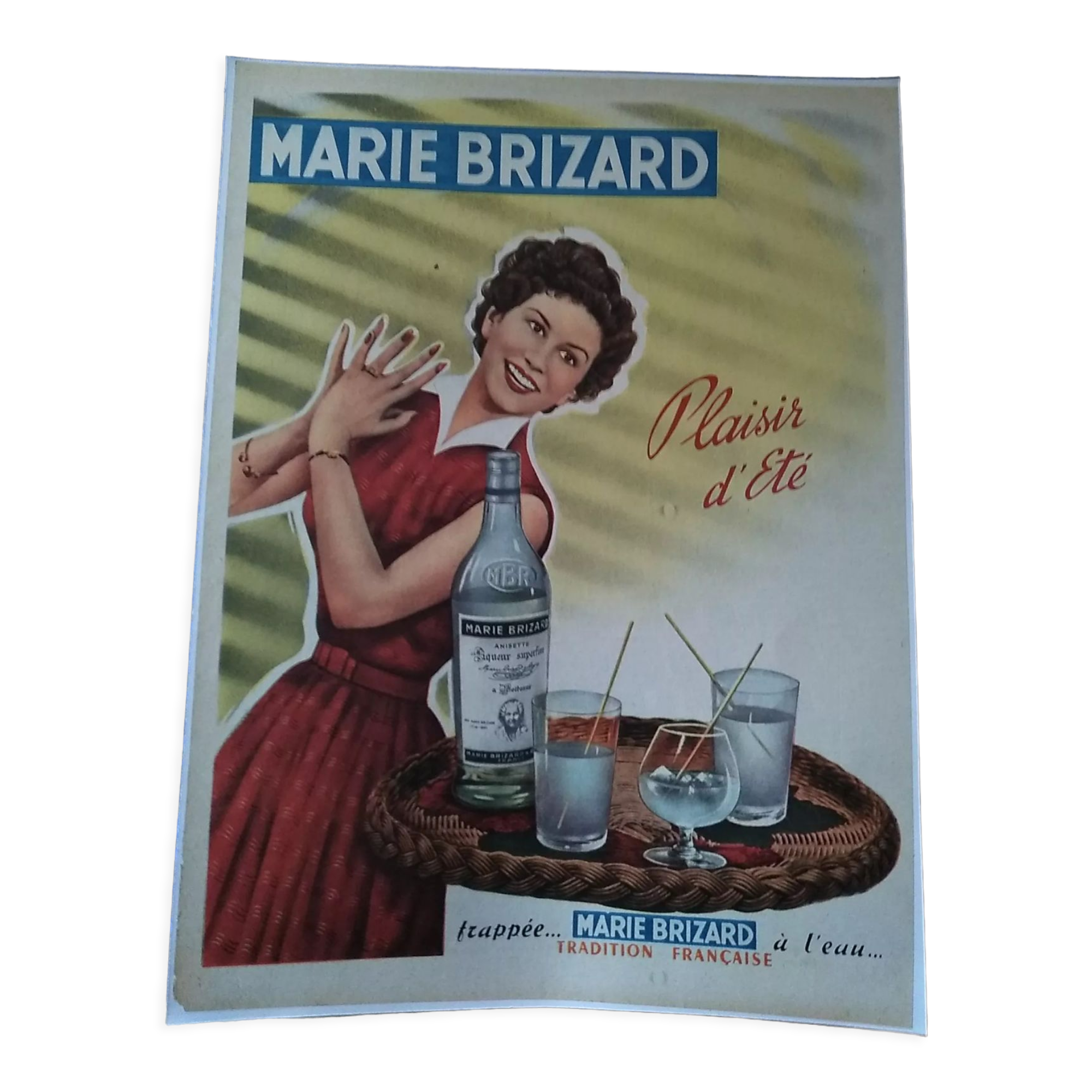 Une publicité couleur Marie Brizard anisette issue d'une revue d'époque