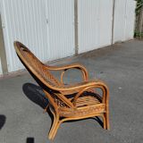 Vintage rattan armchair Mélarti (Emmanuelle style) + custom cushion