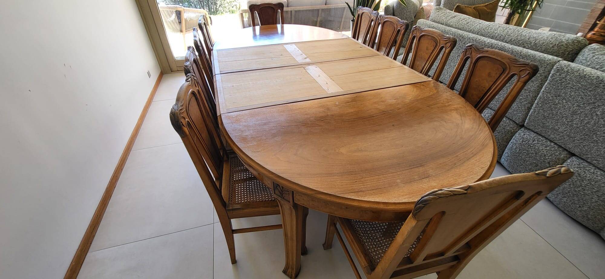 Table and 10 Art Nouveau style chairs.