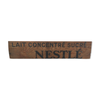 Plaque en bois publicitaire 1920