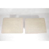 Pair of travertine trundle tables, Italy