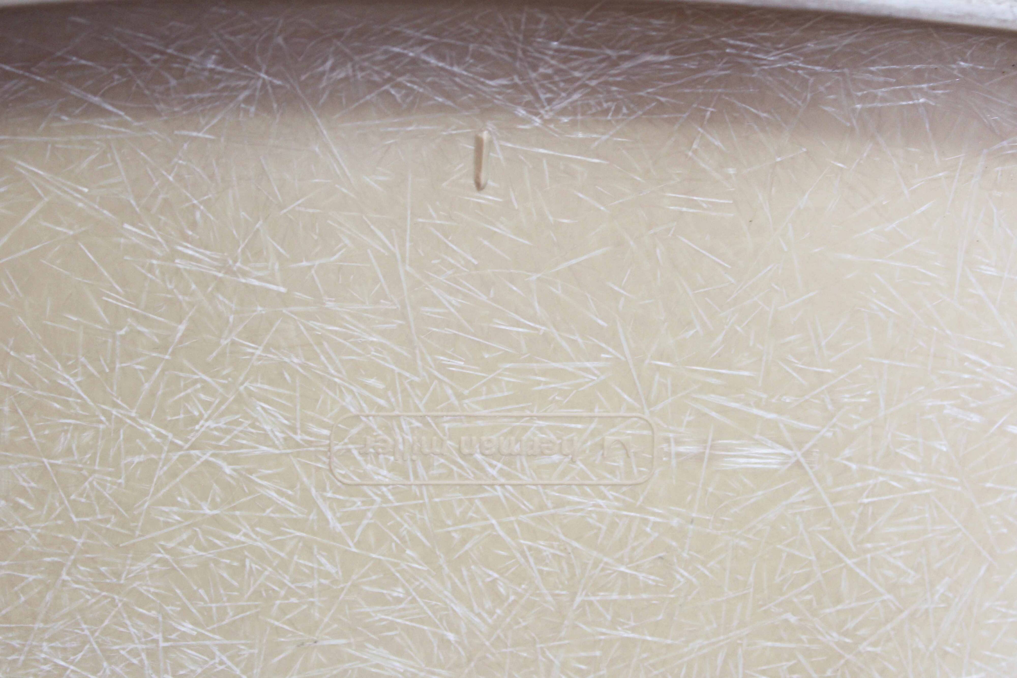 Pair of EAMES La Fonda fiberglass chairs 1970