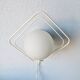 Metal applique with 80s glass sphere
