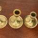 Suite of 6 vintage brass tulip foot candle holders