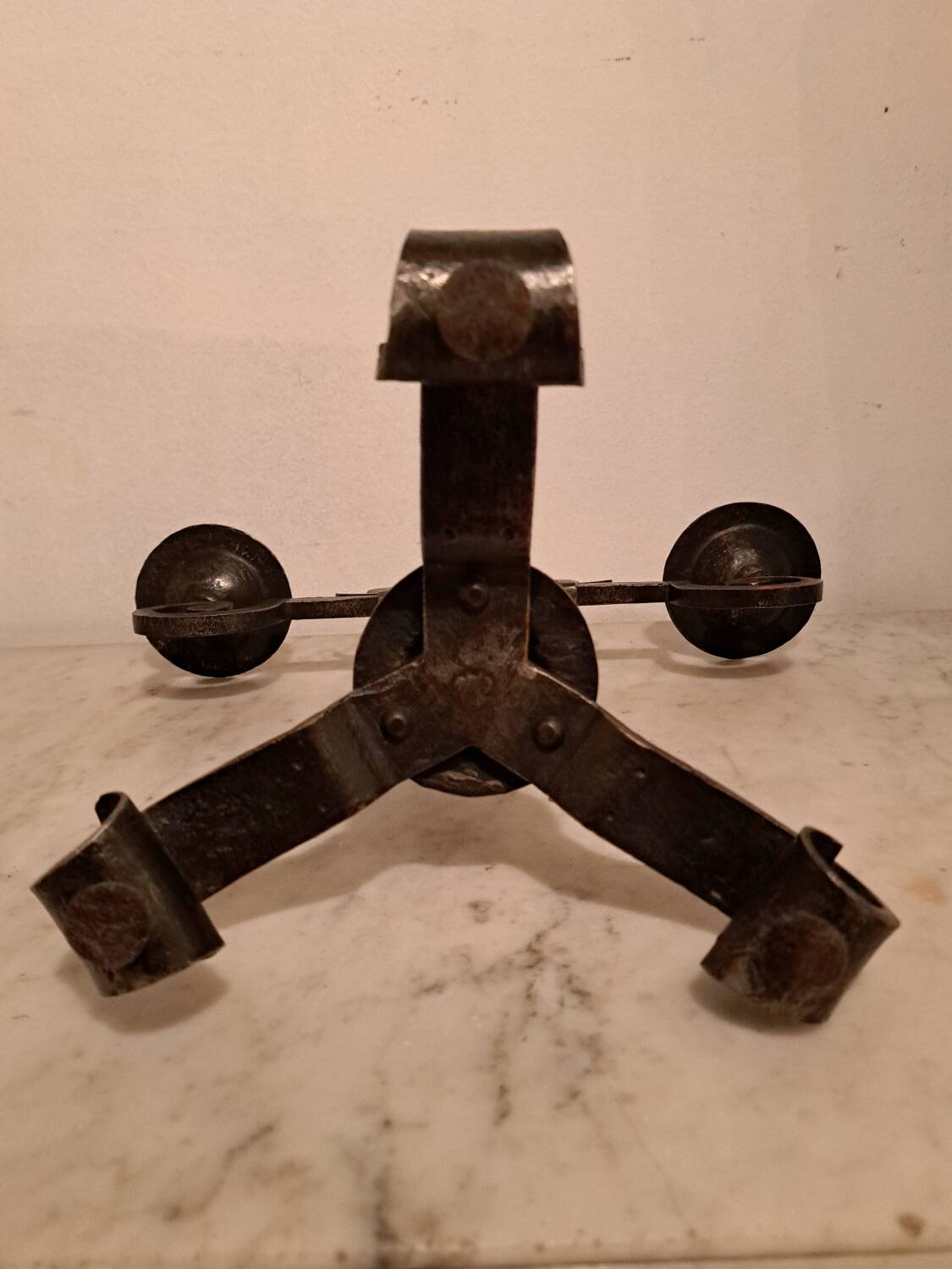 Black wrought iron fleur-de-lis candlestick