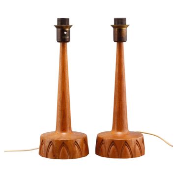 Sculpted teak table lamps for Ab Stilarmatur Tranas, Sweden, 1960.