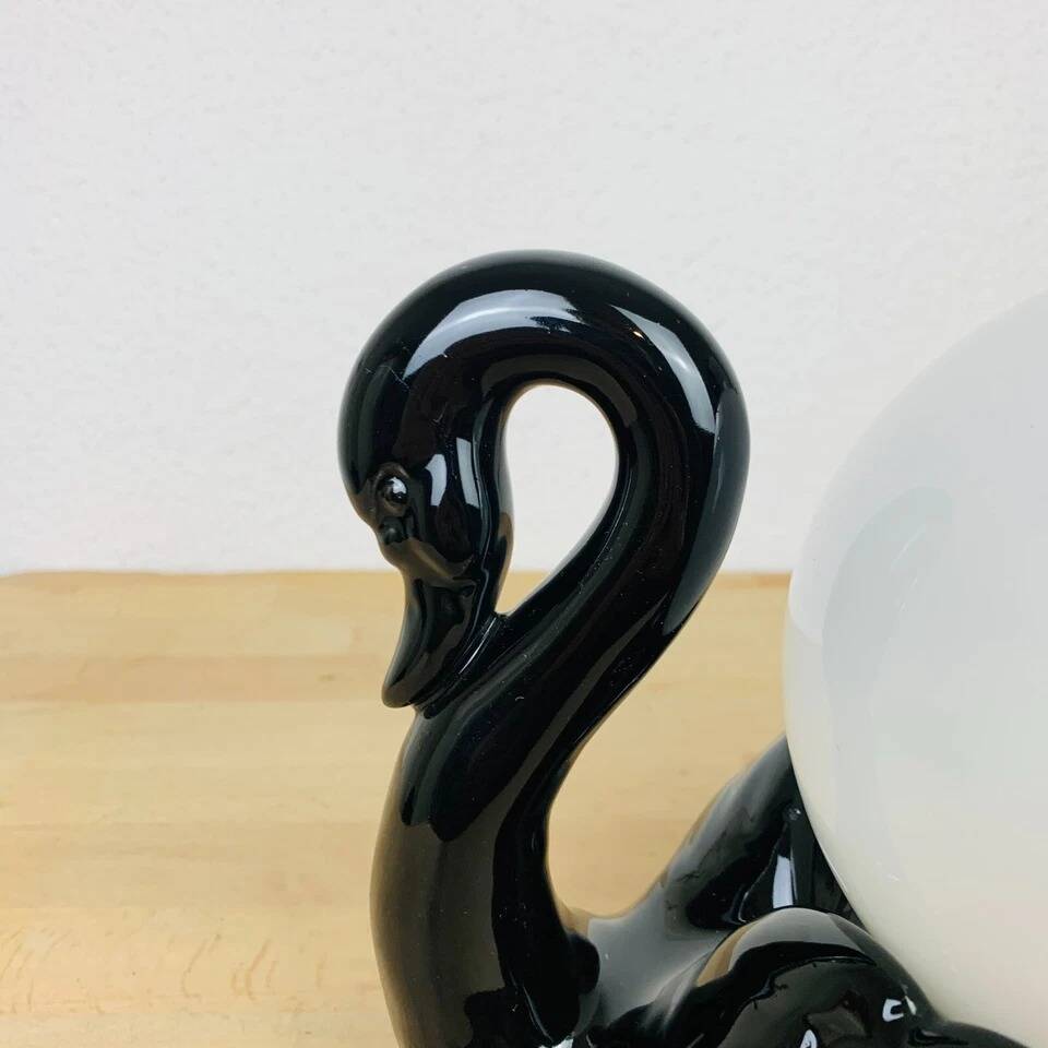 Black ceramic swan lamp with vintage opaline globe