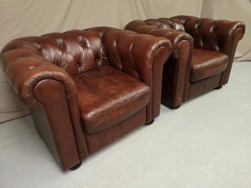 Brown brown leather chesterfield armchairs