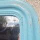 Large Louis-Philippe mirror from the 19th century in wood and stucco with a turquoise blue patina.
