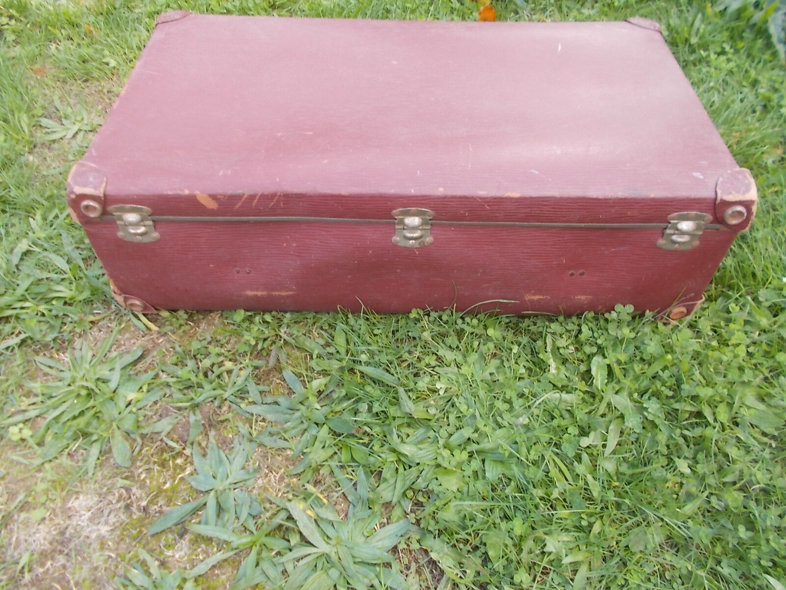 Vintage burgundy suitcase